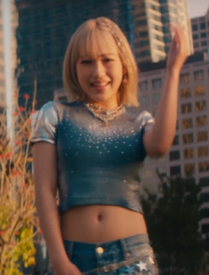 Hinata dancing while walking down the street